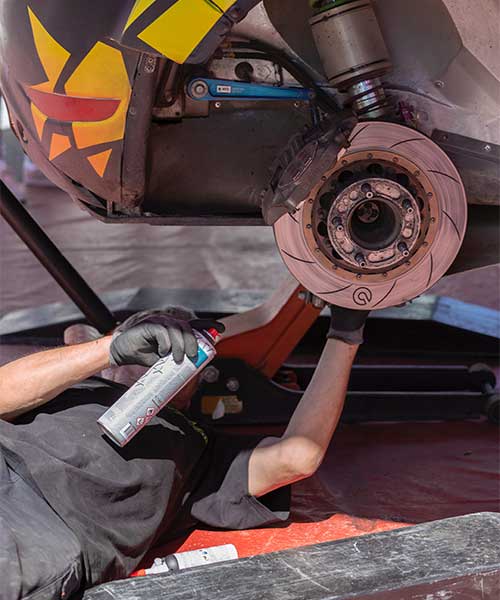Technician mounting new tires